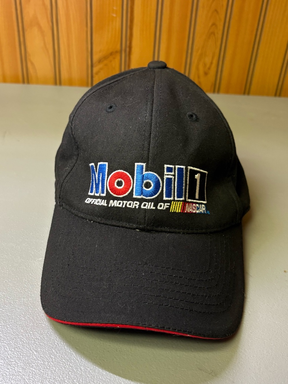 Chase Authentics Black Baseball Cap with Blue, Red and White Mobil 1 Logo